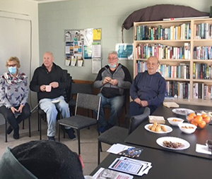 Flagstaff Court tenants enjoyed the talk about mobile library services over morning tea in their community house.