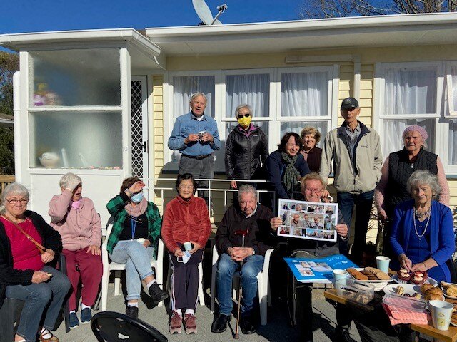 John’s neighbours gathered in his honour