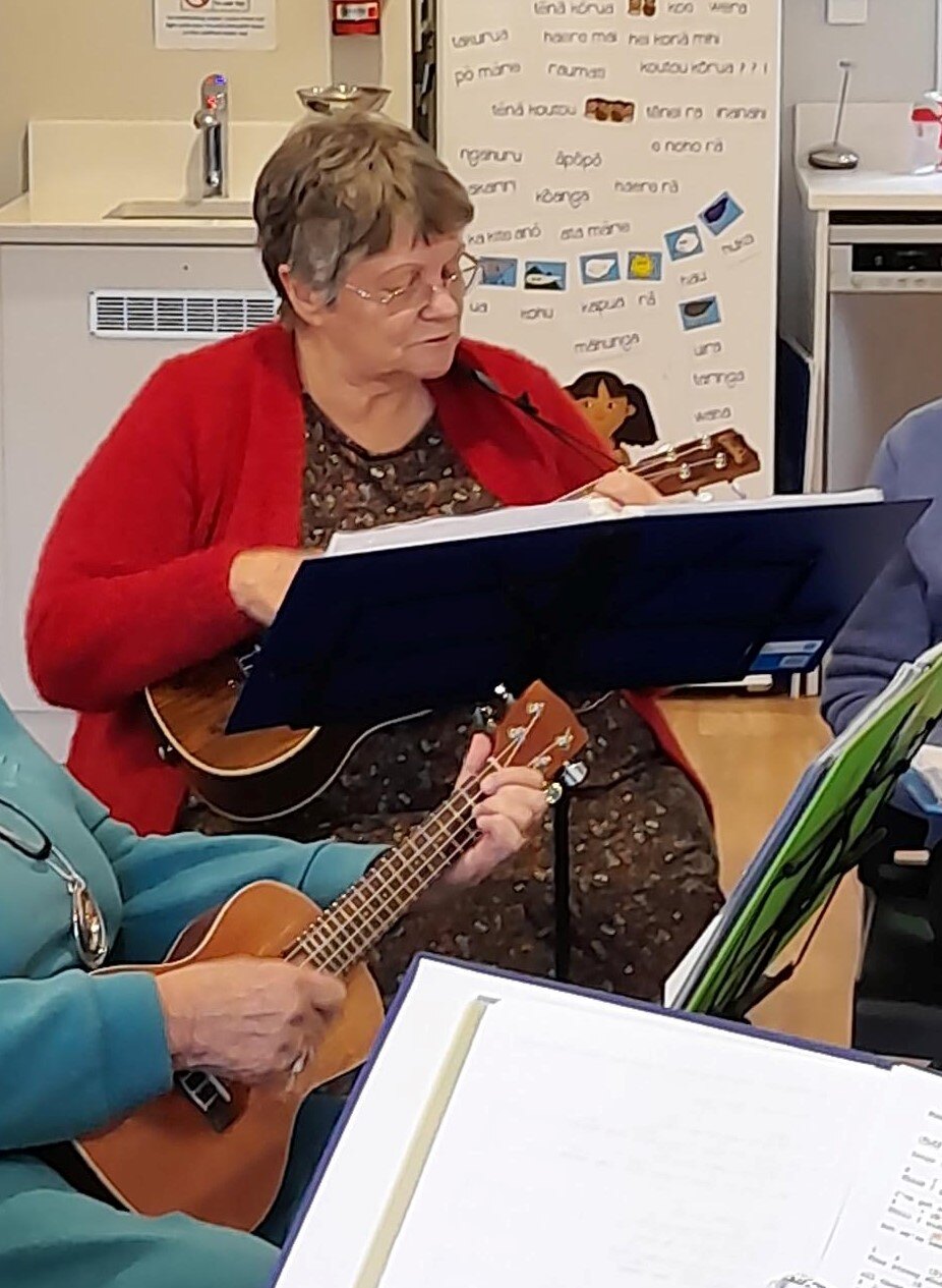 Karen enjoying the ukulele session at the Beach Haven Community House