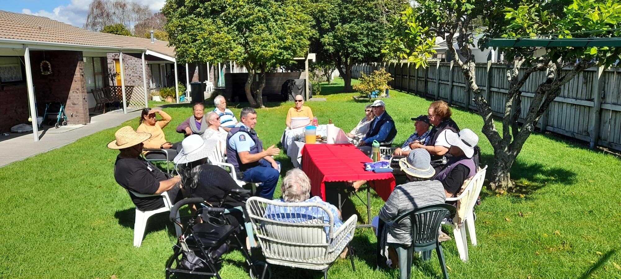 Police Officer Kevin with tenants of Conifer Grove’s Waimana Court.